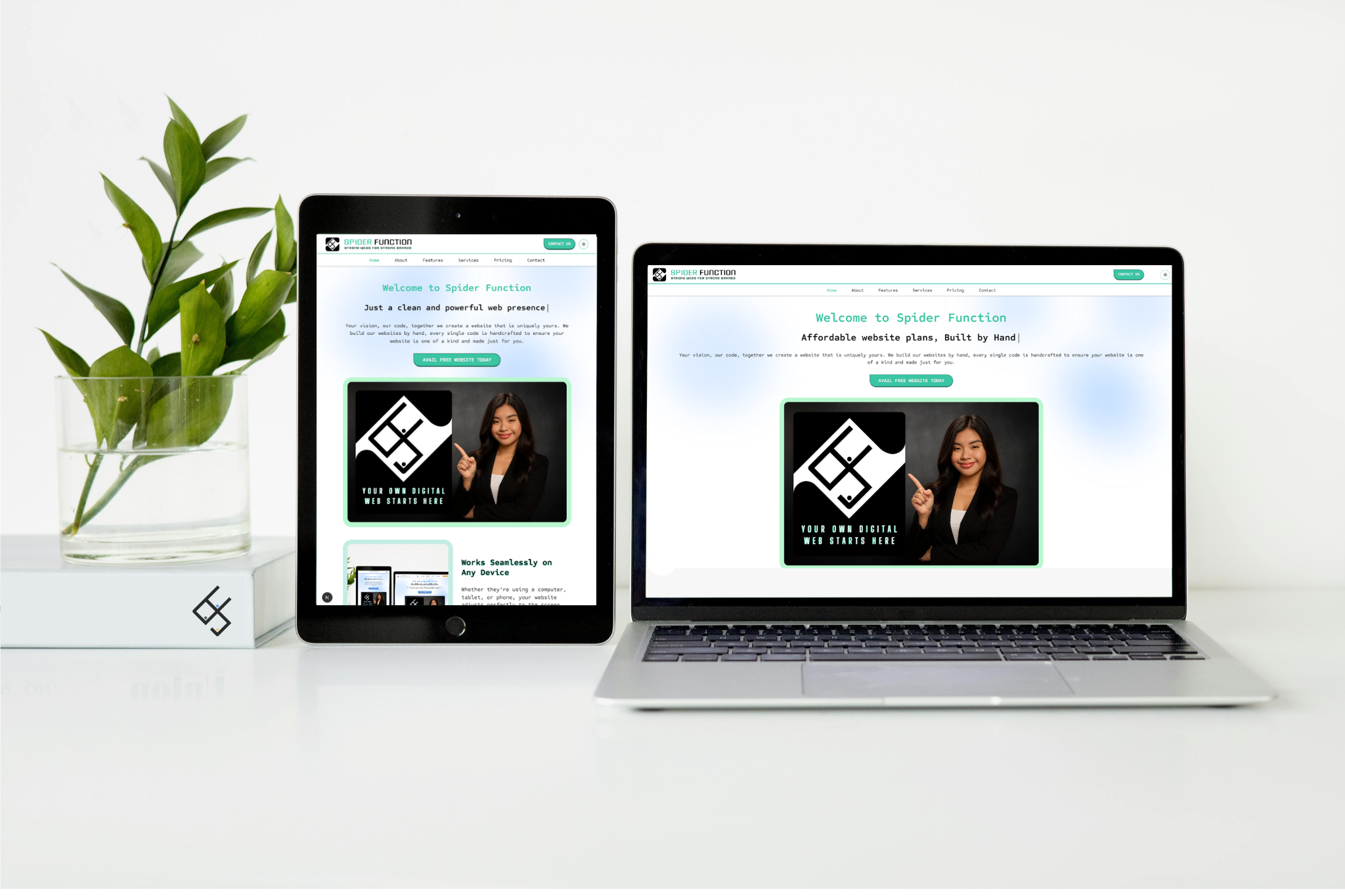 Spider Function website displayed responsively on a tablet and laptop